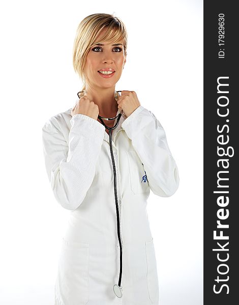 Nurse standing and listening to something, with the stethoscope in her hands. Nurse standing and listening to something, with the stethoscope in her hands