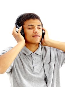 Young Happy Man Listening To Music Stock Photography