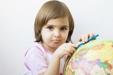 Upset Little Girl Playing With A Crayon Stock Photography
