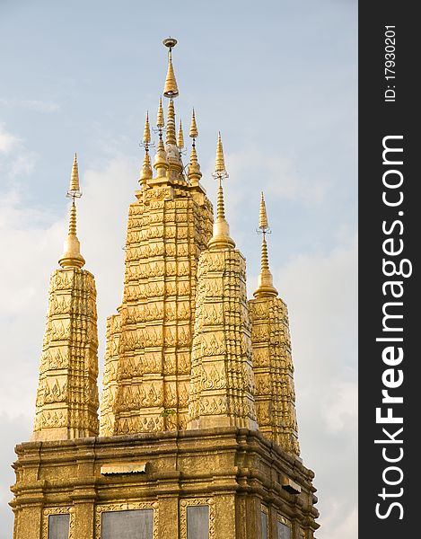 Old golden pagoda on mountain at Ratchaburi province Thailand