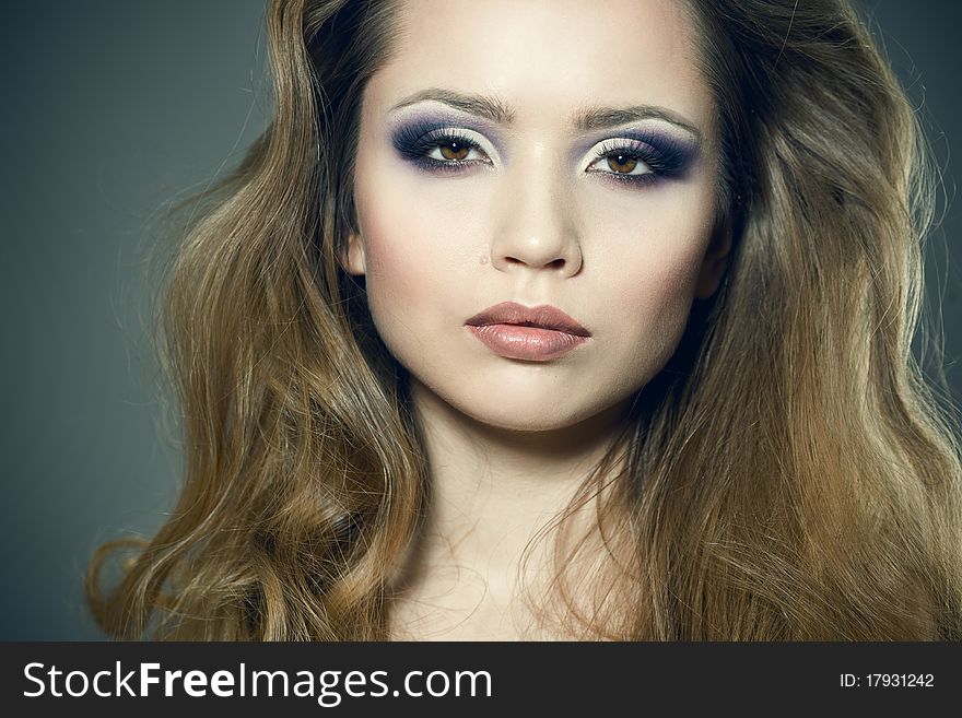 Closeup portrait of a sexy young woman with bright makeup. Closeup portrait of a sexy young woman with bright makeup