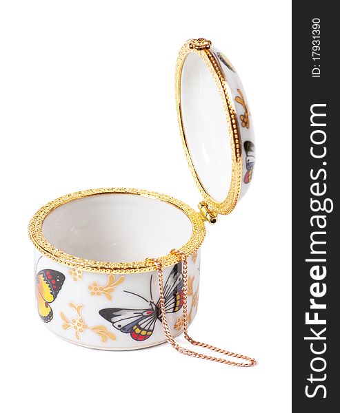 White porcelain box with golden chain. White porcelain box with golden chain