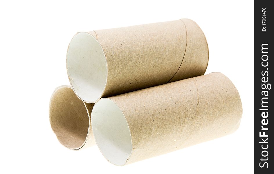 The rolls which have remained from a toilet paper (isolated). The rolls which have remained from a toilet paper (isolated)