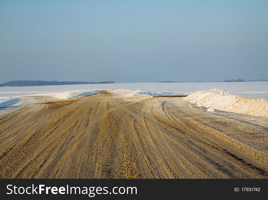 Road which disperses on three directions in a winter season. Road which disperses on three directions in a winter season