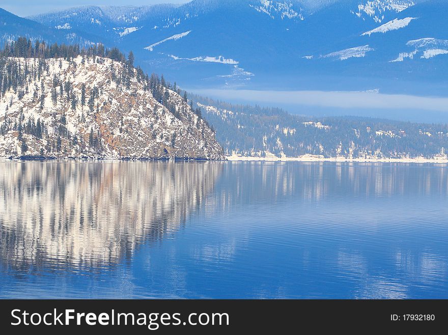 Reflection of Mountain Island and blue skies. Reflection of Mountain Island and blue skies