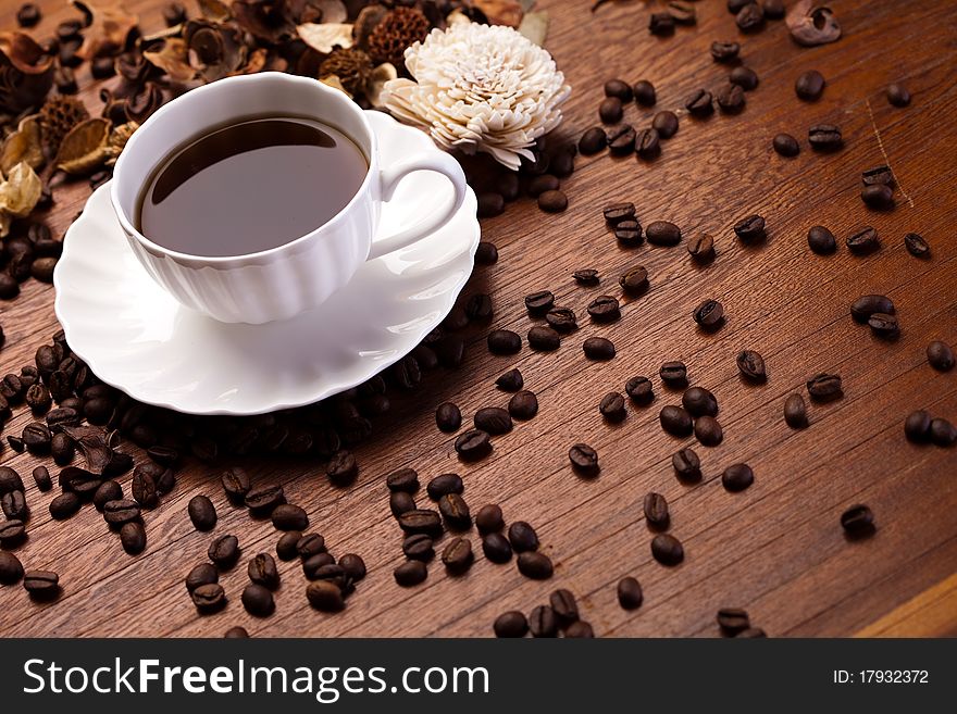 Aroma coffee over wooden background