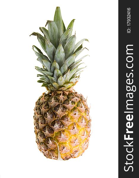 One whole pineapple (mature, with the yellow sides, isolated)