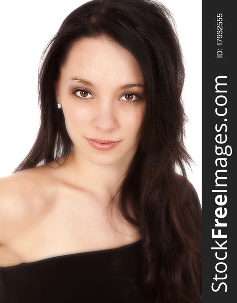 A portrait of a beautiful brunette woman in a black dress. A portrait of a beautiful brunette woman in a black dress.