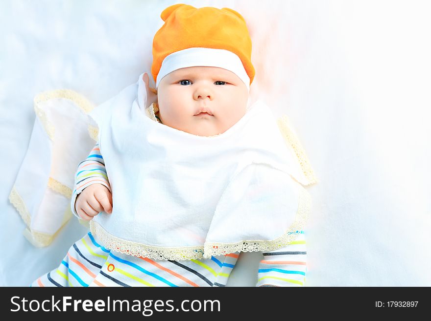 Beautiful baby. Shot in a studio. Isolated on white. Beautiful baby. Shot in a studio. Isolated on white.