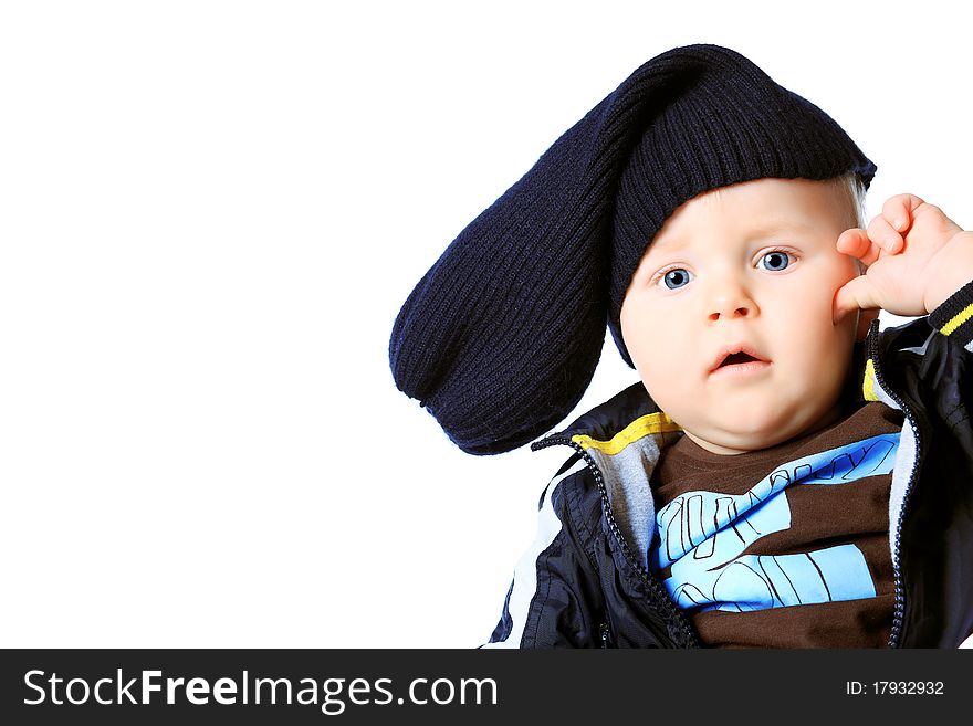 Beautiful little boy. Shot in a studio. Isolated over white background. Beautiful little boy. Shot in a studio. Isolated over white background.