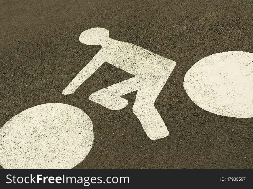 Road with cycling sign symbol.