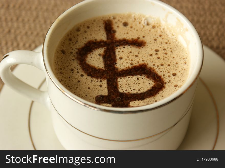 Dollar symbol on a coffee cup