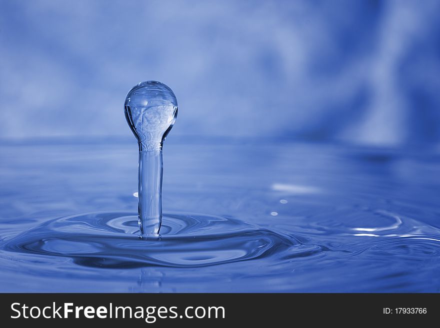 Blue water drop splash