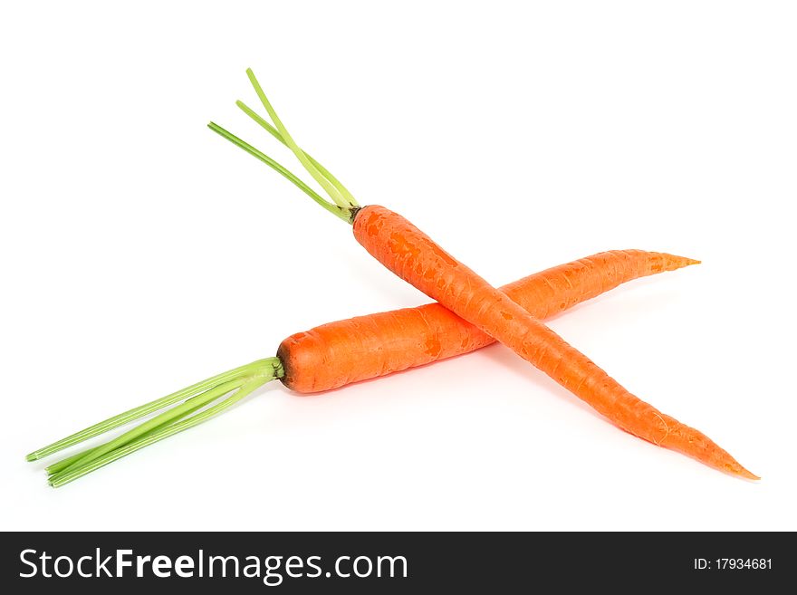 Two fresh carrots isolated on white