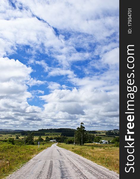 Route under a blue sky with white clouds. Route under a blue sky with white clouds