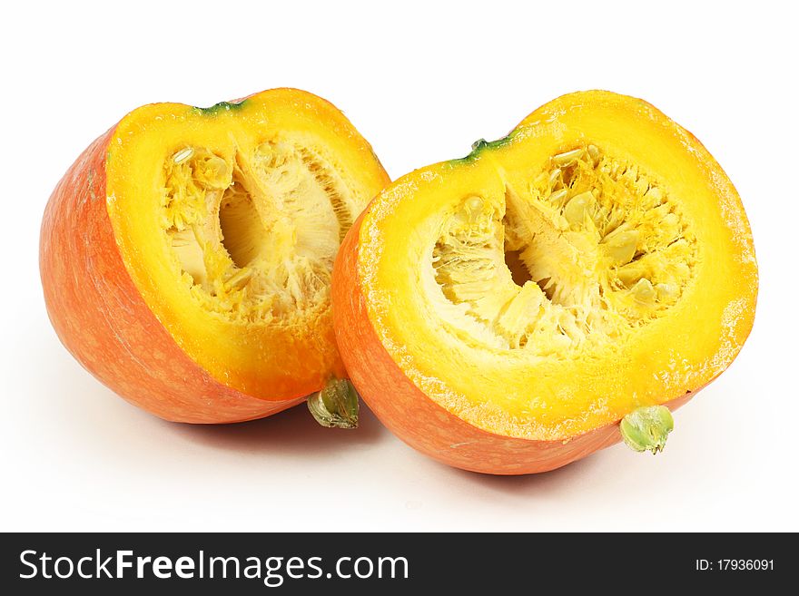 Cut orange colored squash on a white background. Cut orange colored squash on a white background.