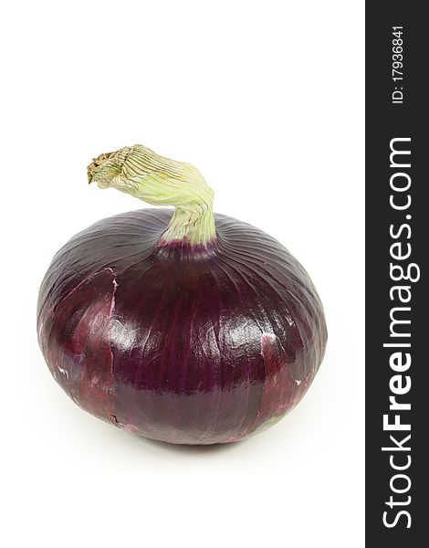 Single purple onion on a white background