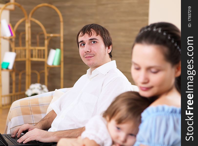 Young mother with a little daughter together at home. Young mother with a little daughter together at home