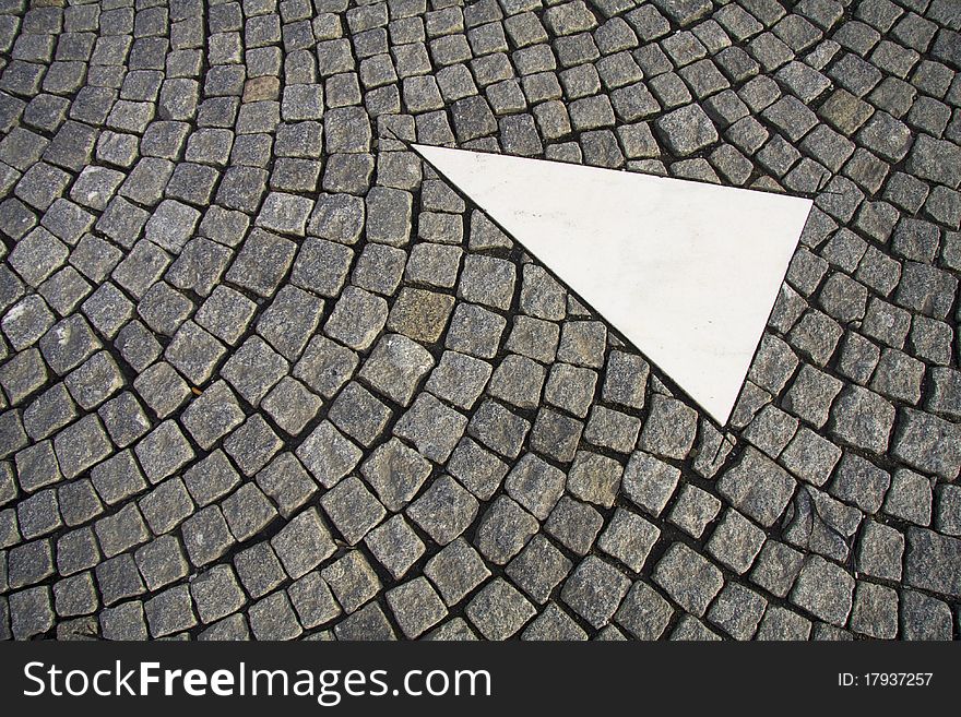 Cobble stones with traffic sign