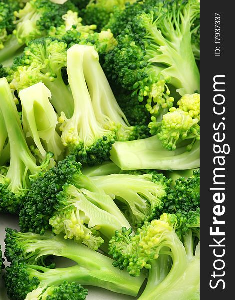 A bunch of broccoli tips bunched together as a background