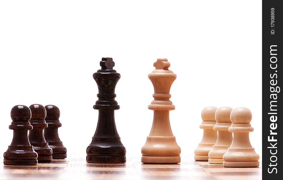 Black and white chess pieces isolated on a white background