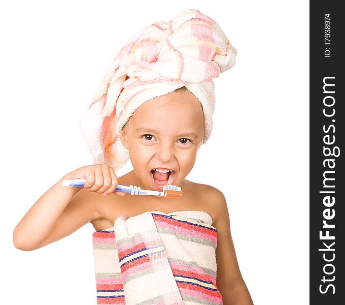 Happy little girl with toothbrush. Beautiful caucasian model. Isolated on white background.