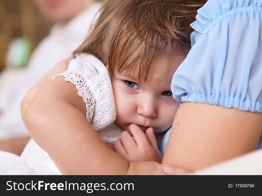 Young Mother With A Daughter At Home