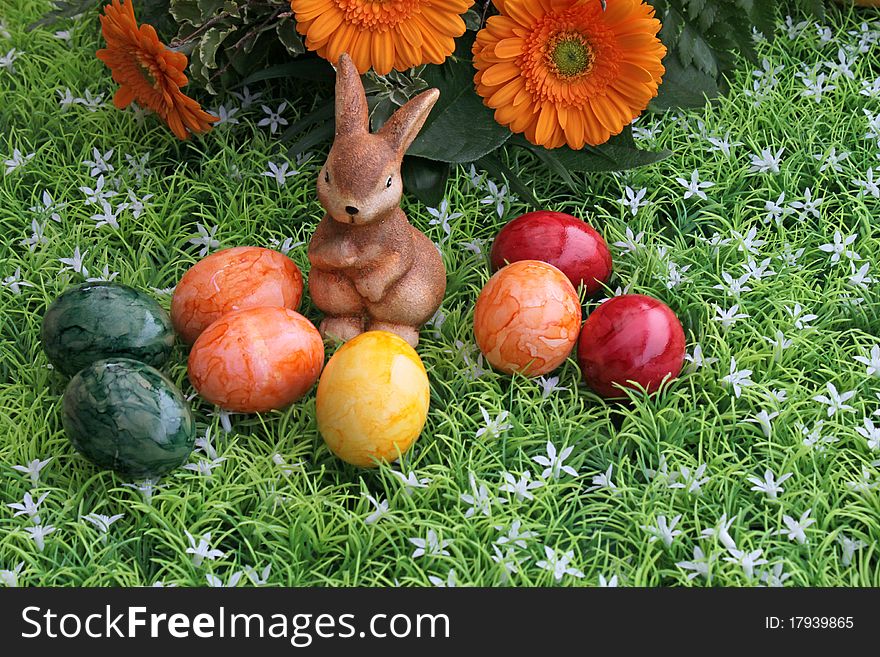 Funny bunny with Easter eggs. Funny bunny with Easter eggs