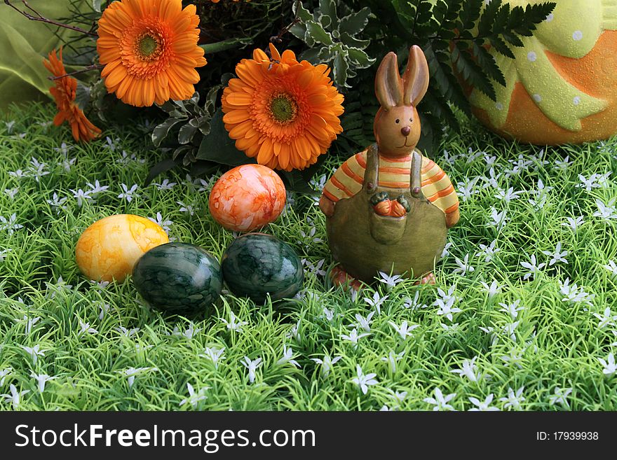 Funny bunny with Easter eggs. Funny bunny with Easter eggs