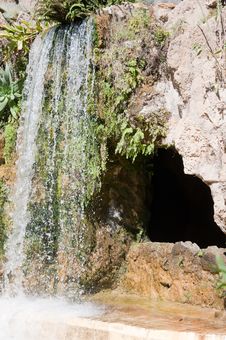 Waterfall And Grotto In The Genoves Park In Cadiz Royalty Free Stock Photos