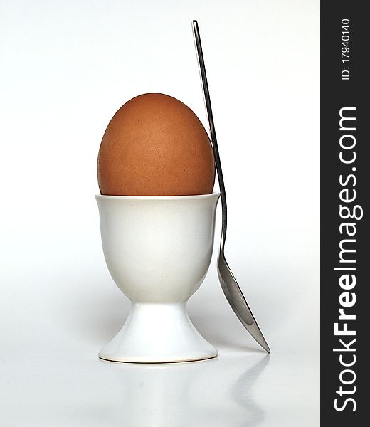 An egg cup and a spoon