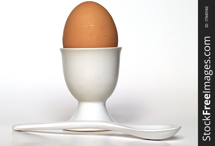 An egg cup and a spoon