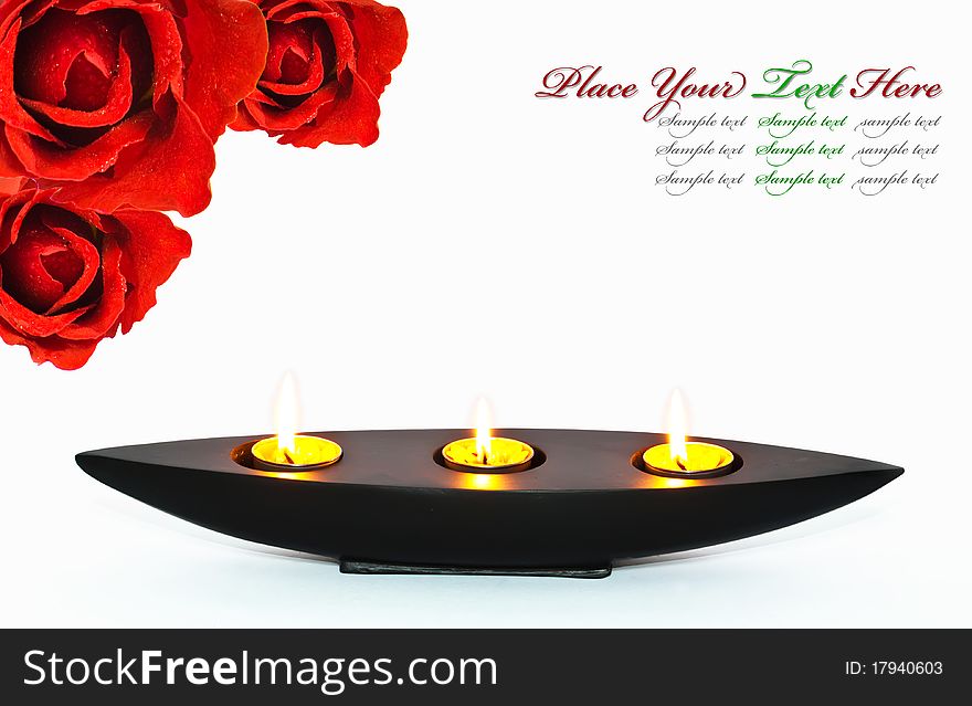 Red roses and aromatherapy candles. Red roses and aromatherapy candles
