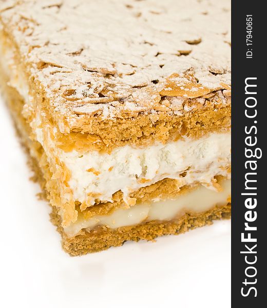 Cake almond with whipped cream and cream