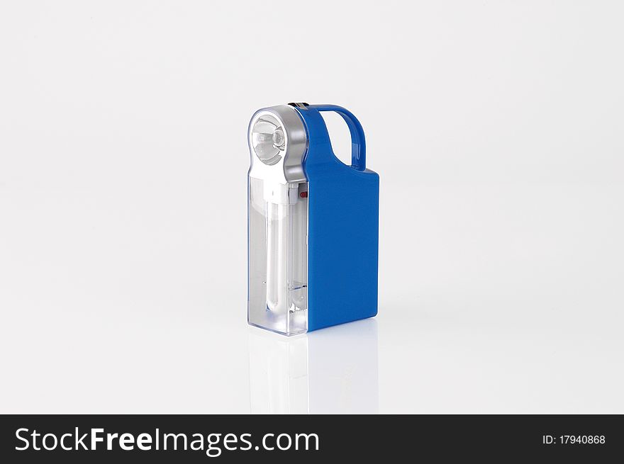 Blue flashlight on a white background