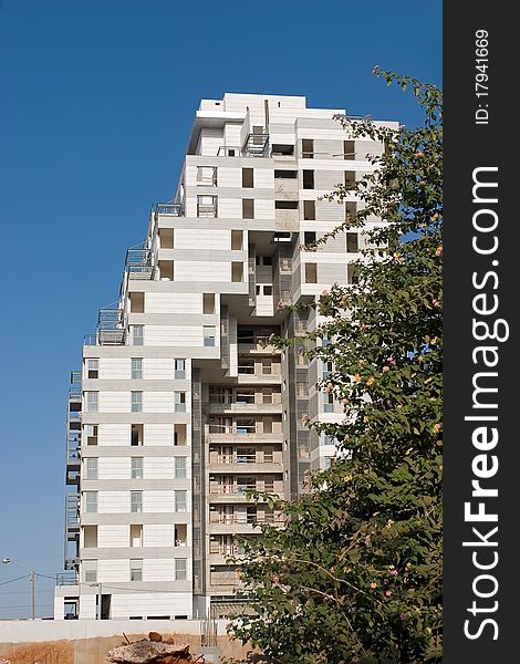 Residential building construction site and blue sky