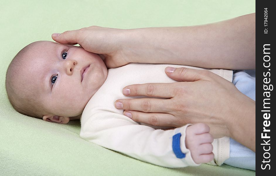 Baby in mother hands