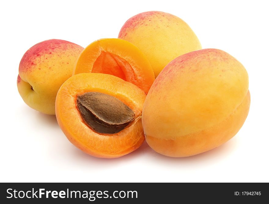 Heap ripe apricot on white background