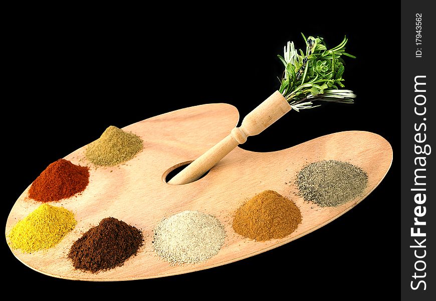 Herbs and spices on a wooden palette