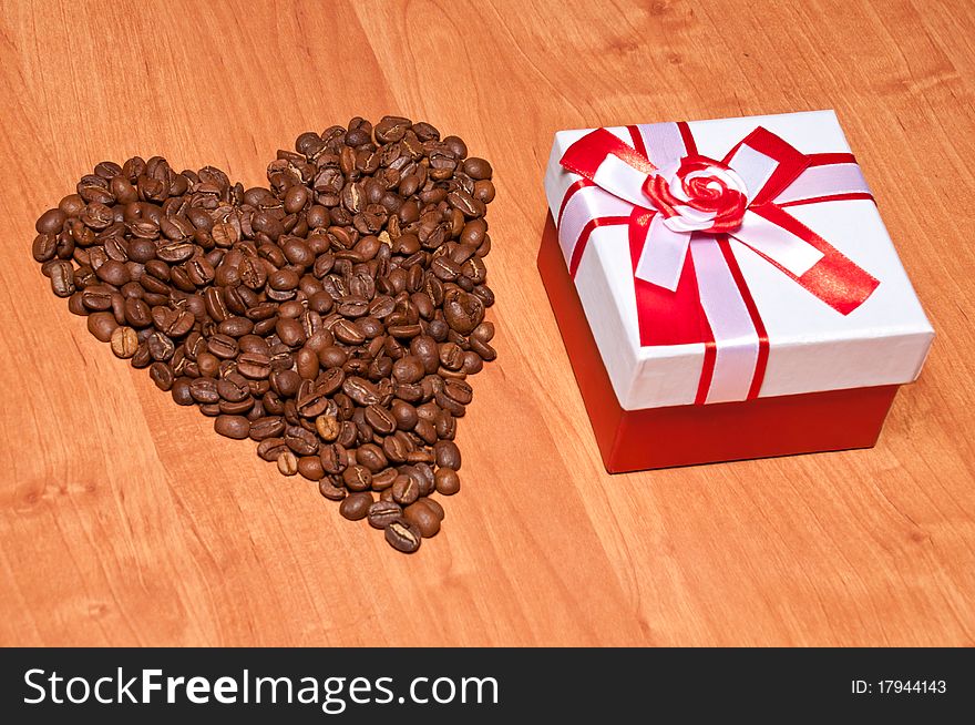 St. Valentine day surprise: coffee heart and gift. St. Valentine day surprise: coffee heart and gift