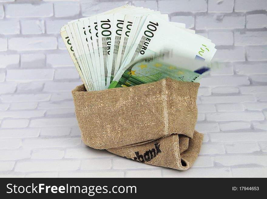 A bag with many Euro banknotes. A bag with many Euro banknotes