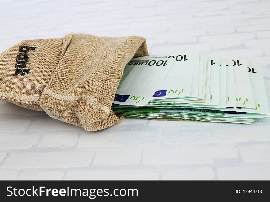 A bag with many Euro banknotes. A bag with many Euro banknotes