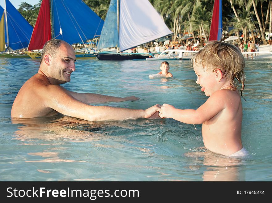 Father And Children In Water