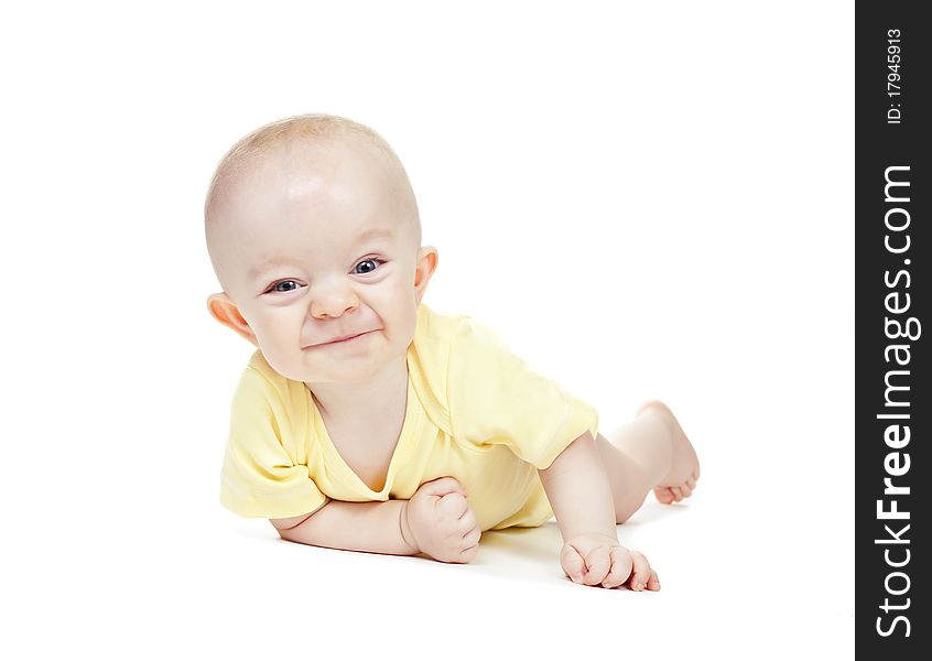 Small beautiful laughing baby boy on a white background