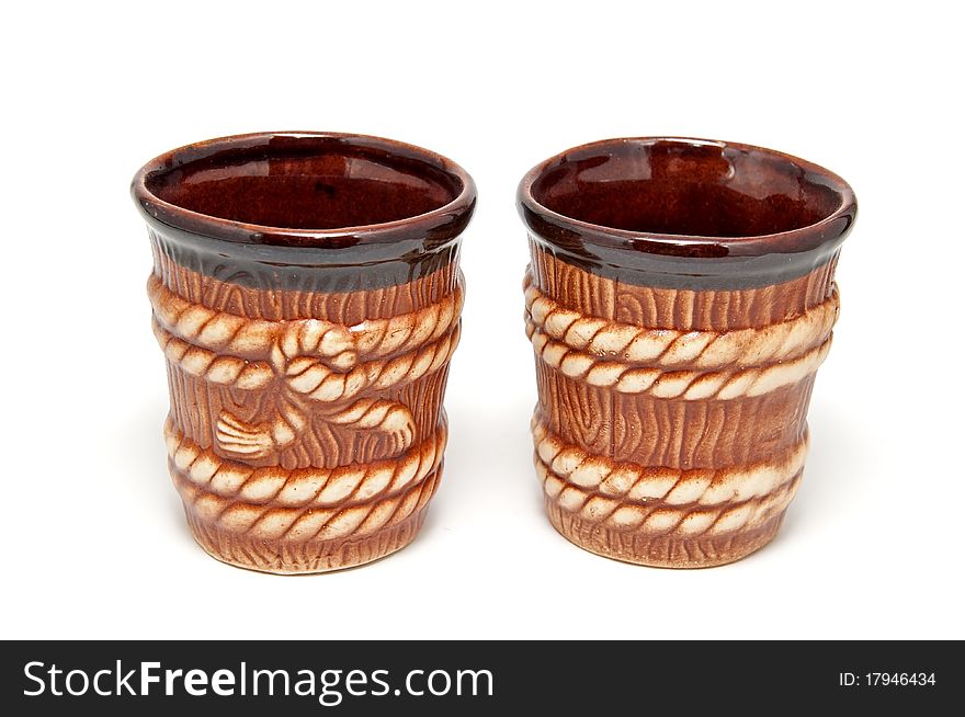 2 brown decorative cups on a white background