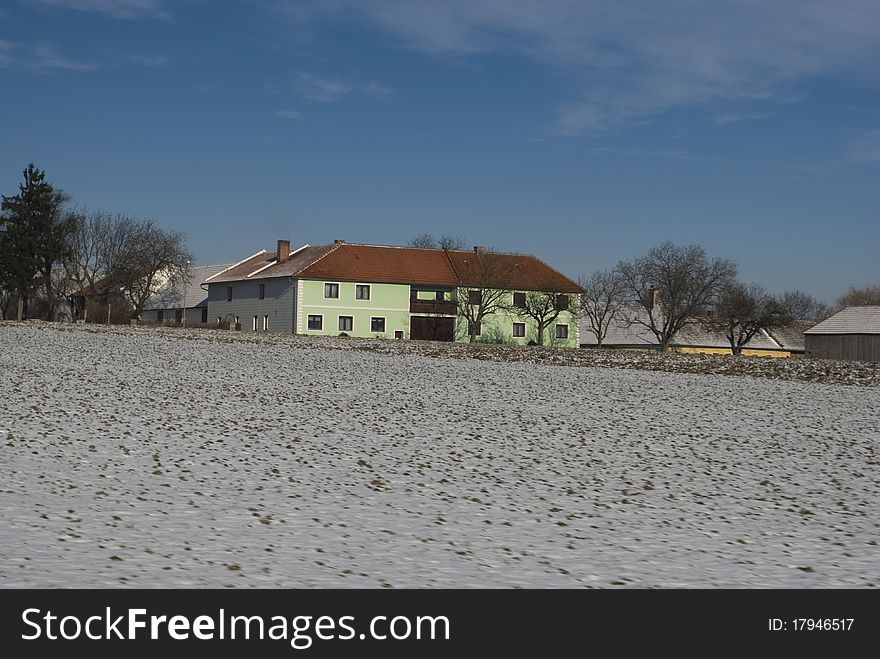 Green country house in winter. covered with snow. Green country house in winter. covered with snow