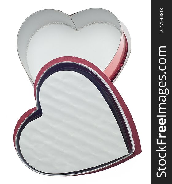 Valentines Day Candy Hidden on a Heart Shaped Box Isolated on White with a Clipping Path.