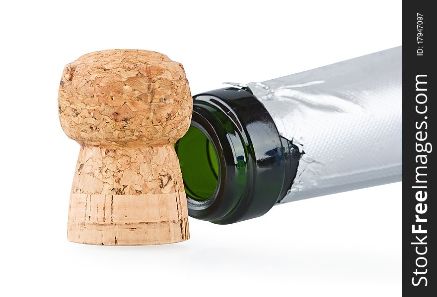 Champagne and cork on the white