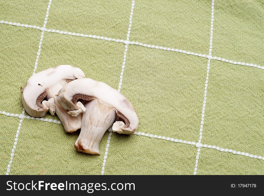 Fresh Button Mushroom Food Background on Green Kitchen Towel. Fresh Button Mushroom Food Background on Green Kitchen Towel.