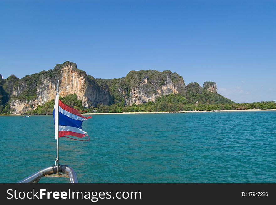 Limestone cliffs in Krabi province and flag of Thailand. Limestone cliffs in Krabi province and flag of Thailand